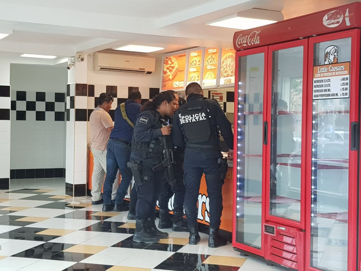 Llegan por pizzas y se van sin pagar y con dinero de la caja