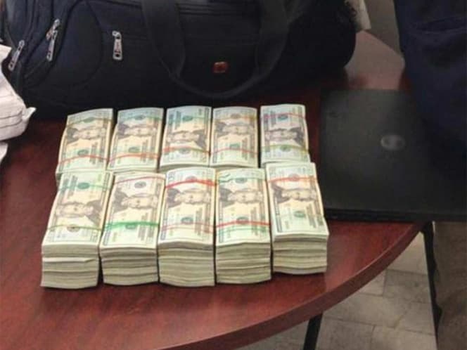Intentó ocultar 100 mil dólares en maleta con destino a Cancún