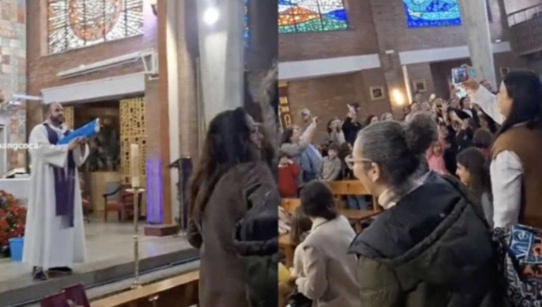 Cura desata polémica tras “bendecir” a niños con una pistola de agua en la iglesia