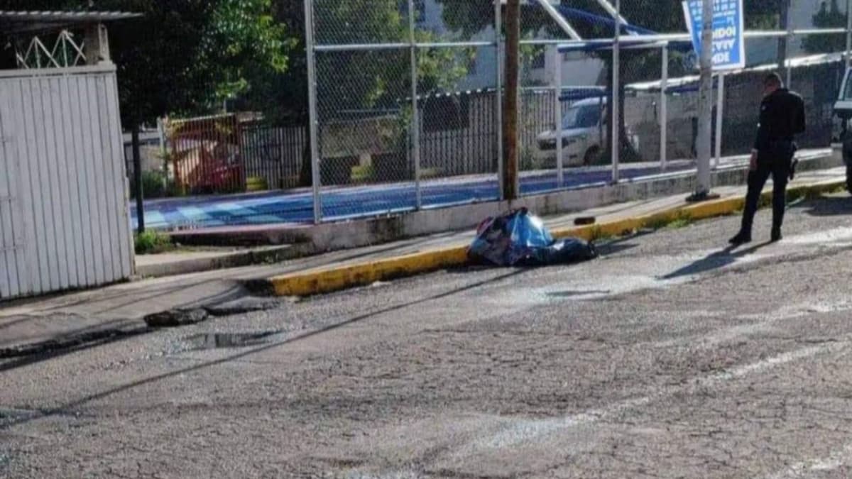 Hallan restos humanos sobre la calle de un fraccionamiento en Puebla